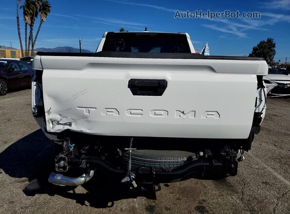 3TYJDAKN7ST020337 2025 TOYOTA TACOMA White Հետևի տեսք
