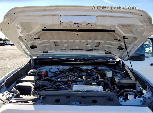 3TYJDAKN7ST020337 2025 TOYOTA TACOMA White Սալոնի հետևի տեսք