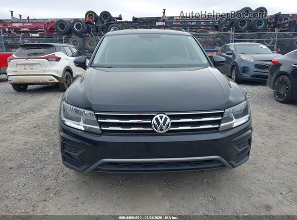 3VV0B7AX6JM057088 2018 VOLKSWAGEN TIGUAN Black Vista interior trasera