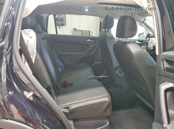 3VV2B7AX0JM031546 2018 VOLKSWAGEN TIGUAN Black Widok wnętrza z tyłu