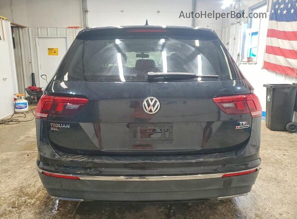 3VV2B7AX0JM031546 2018 VOLKSWAGEN TIGUAN Black Widok z tyłu