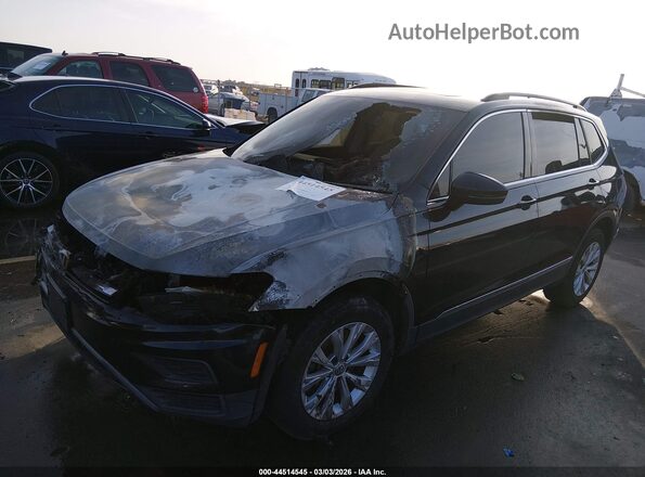 3VV2B7AX0JM139102 2018 VOLKSWAGEN TIGUAN Black Front view