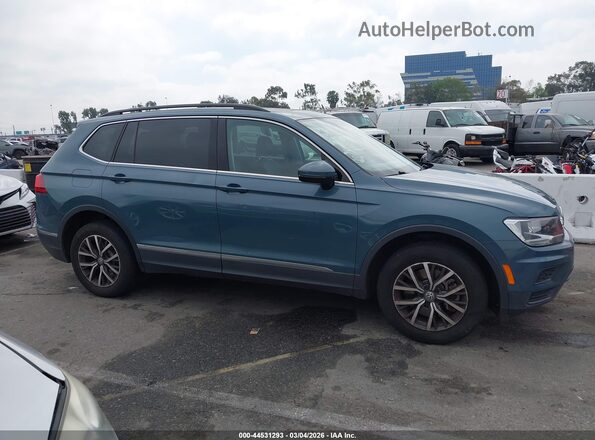 3VV3B7AX1LM106200 2020 VOLKSWAGEN TIGUAN Синий Вид задней части салона