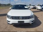 2020 Volkswagen Tiguan 2.0t Se/2.0t Se R-line Black/2.0t Sel White vin: 3VV3B7AX3LM176457