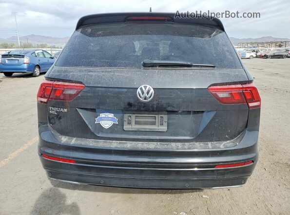 3VV3B7AX4KM198630 2019 VOLKSWAGEN TIGUAN Black Widok z tyłu