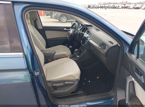 3VV3B7AX6JM039395 2018 VOLKSWAGEN TIGUAN Blue Vista interior delantera