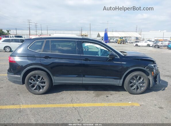 3VV3B7AX8RM059806 2024 VOLKSWAGEN TIGUAN Черный Вид задней части салона
