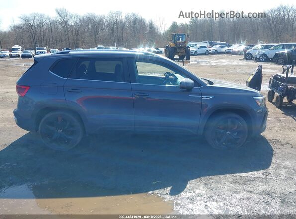 3VVEX7B29PM318183 2023 VOLKSWAGEN TAOS Серый Вид задней части салона