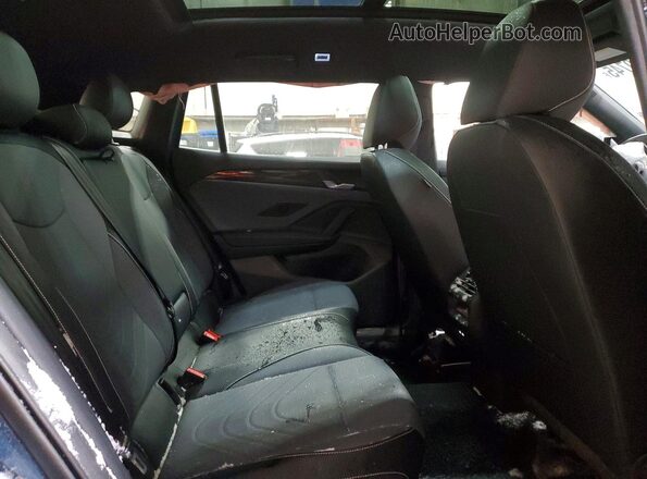 3VVGR7RM7TM036435 2026 VOLKSWAGEN TIGUAN Blue Widok wnętrza z tyłu