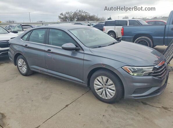 3VWC57BU7KM154001 2019 VOLKSWAGEN JETTA Серебряный Передняя правая четверть