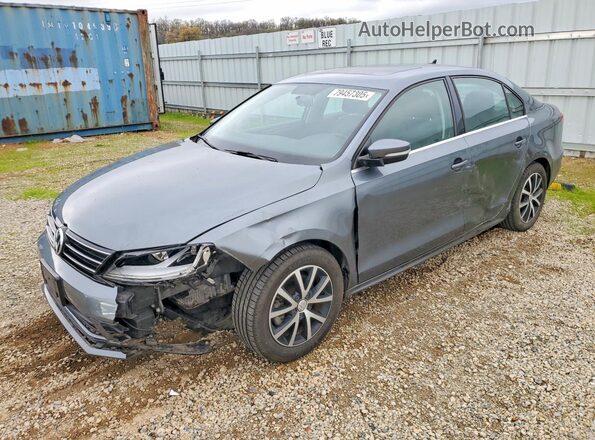 3VWDB7AJ1HM221639 2017 VOLKSWAGEN JETTA Gray Vista tres cuartos delantera izquierda
