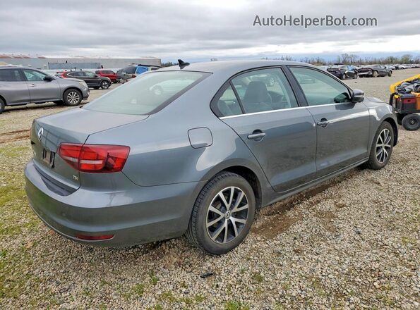 3VWDB7AJ1HM221639 2017 VOLKSWAGEN JETTA Gray Trasero derecho