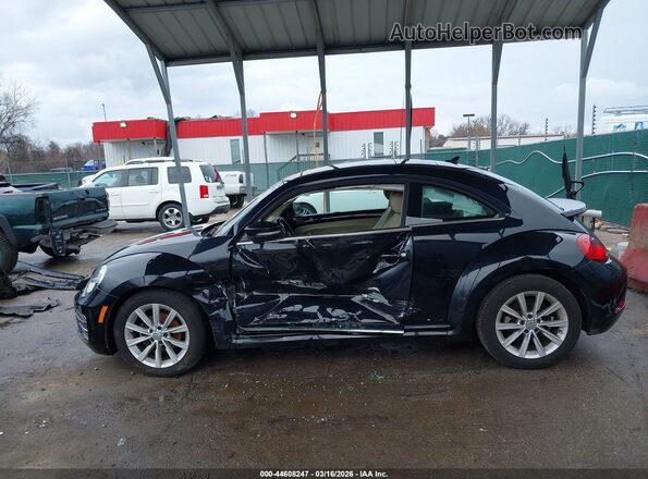 3VWJD7AT2JM702343 2018 VOLKSWAGEN BEETLE Черный Вид задней части салона