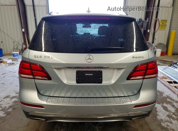 4JGDA5HB3GA704520 2016 MERCEDES-BENZ GLE Серебряный Вид салона спереди