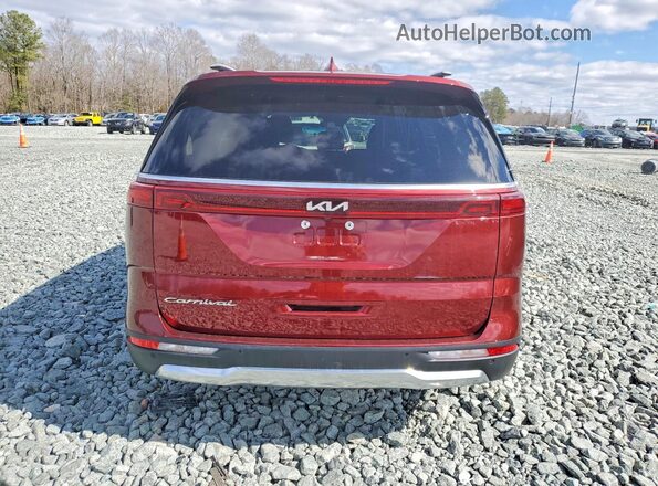 KNDNE5H38N6082034 2022 KIA CARNIVAL Красный Вид салона спереди