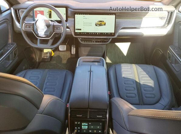 7FCTGAAA2PN019677 2023 RIVIAN RIT Желтый Вид щитка приборов