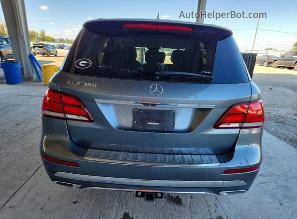 4JGDA5JB6JA998609 2018 MERCEDES-BENZ GLE Серый Вид сзади