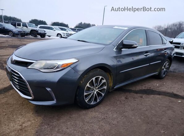 4T1BK1EB0JU265641 2018 TOYOTA AVALON Серый Передняя левая четверть