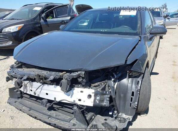 4T1DAACK9SU593690 2025 TOYOTA CAMRY Серый Вид спереди