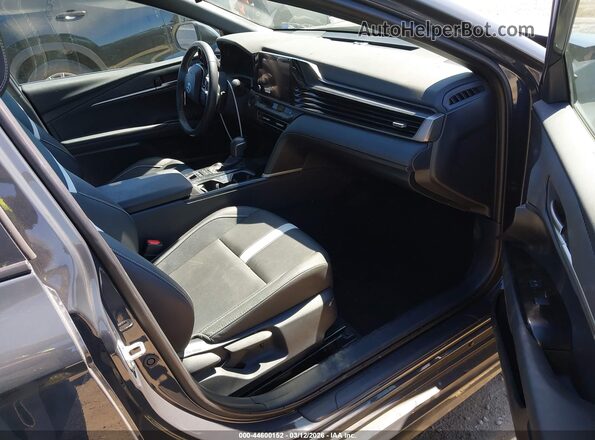 4T1DAACK9SU593690 2025 TOYOTA CAMRY Серый Вид салона спереди