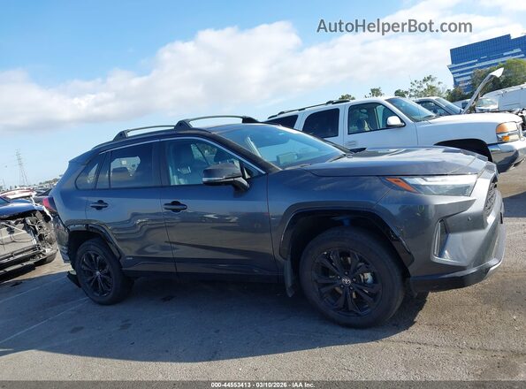 4T3E6RFV2PU128256 2023 TOYOTA RAV4 HYBRID Серый Вид задней части салона