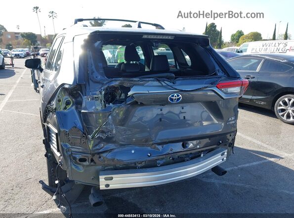 4T3E6RFV2PU128256 2023 TOYOTA RAV4 HYBRID Серый Вид спереди