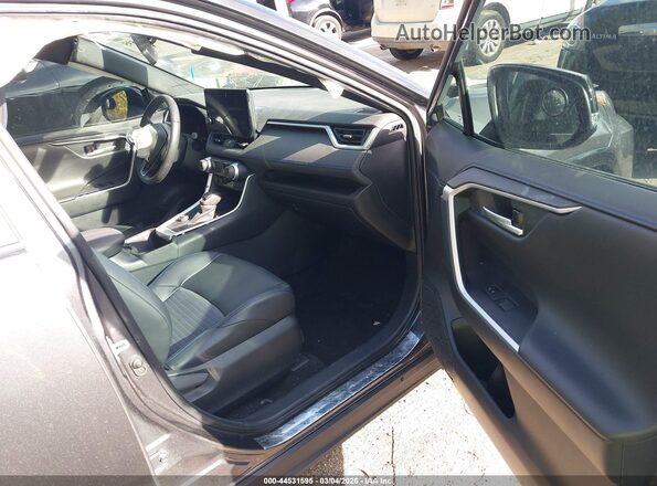 4T3E6RFV7RU145993 2024 TOYOTA RAV4 HYBRID Gray Widok wnętrza z przodu