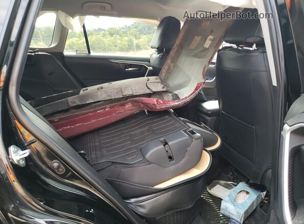 4T3RWRFV9RU147195 2024 TOYOTA RAV4 Черный Вид задней части салона