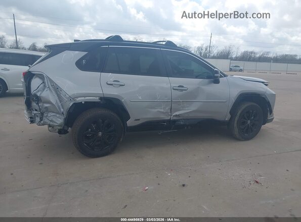 4T3e6RFV6SU188873 2025 TOYOTA RAV4 HYBRID Серый Вид задней части салона