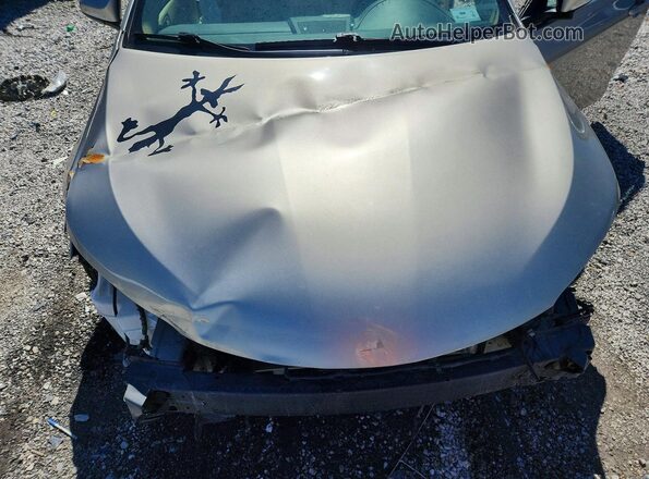 4T4BF1FK2GR571449 2016 TOYOTA LE Серебряный Вид задней части салона