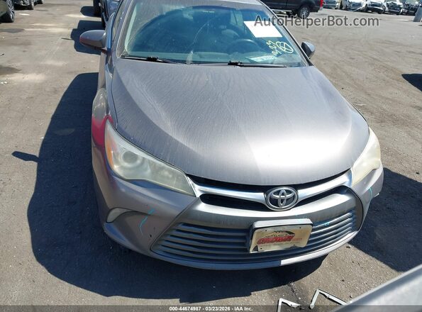 4T4BF1FK3GR569872 2016 TOYOTA LE Серый Вид щитка приборов