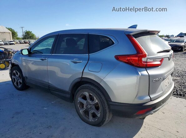 7FARW1H58HE000423 2017 HONDA CRV Серебряный Задняя правая четверть