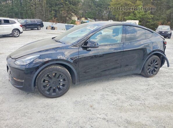 7SAYGDEE1NA007462 2022 TESLA MODEL Black Vista tres cuartos delantera izquierda