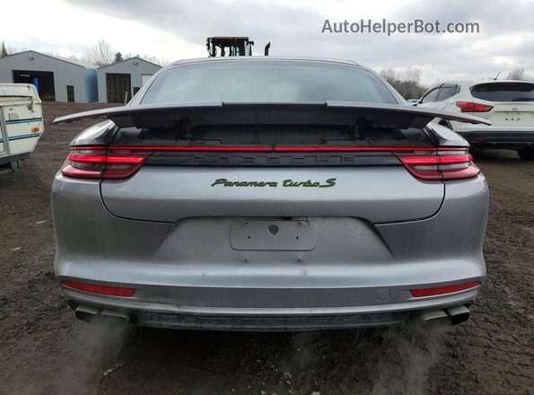 WP0AH2A79KL147049 2019 PORSCHE PANAMERA Серебряный Вид салона спереди