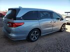 2018 Honda Odyssey Touring Серебряный vin: 5FNRL6H86JB006562