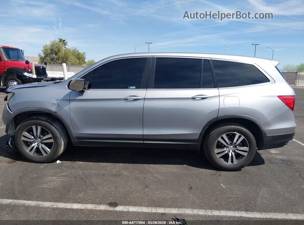 5FNYF5H38JB009240 2018 HONDA PILOT Серебряный Вид задней части салона