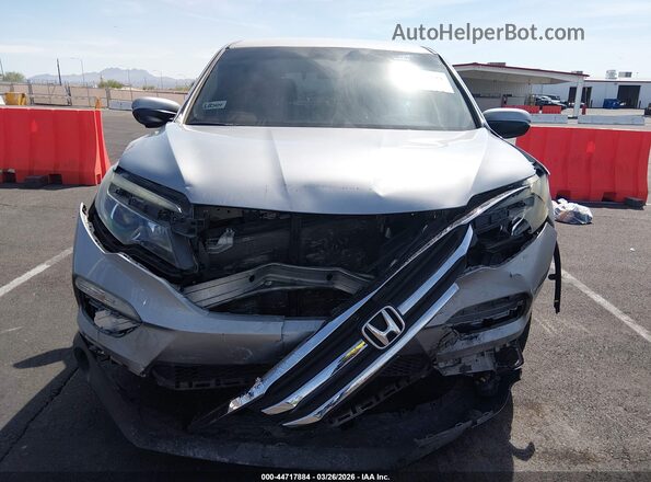 5FNYF5H38JB009240 2018 HONDA PILOT Серебряный Вид панели приборов