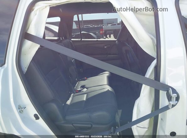 5FNYF7H55MB001114 2021 HONDA PASSPORT White VIN sticker view