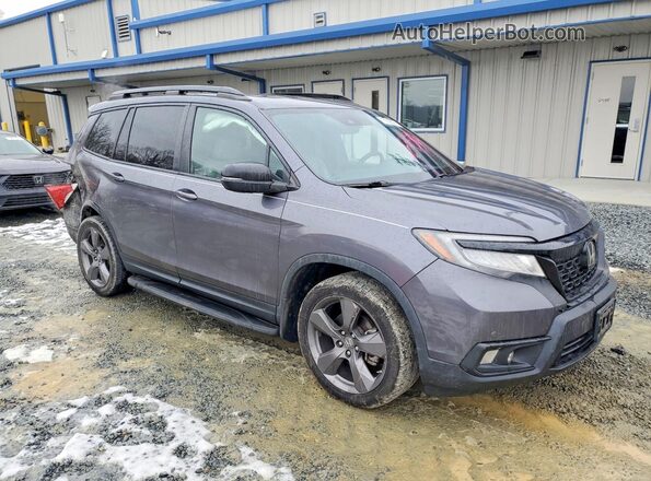 5FNYF7H90MB009141 2021 HONDA PASSPORT Gray Front right