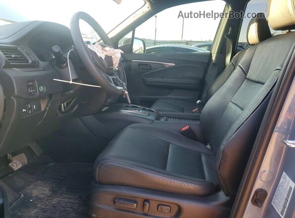 5FNYF8H50PB019286 2023 HONDA PASSPORT Gray Widok wnętrza z przodu