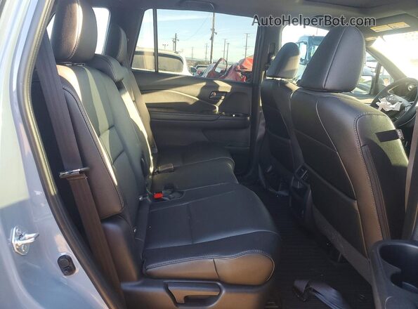 5FNYF8H50PB019286 2023 HONDA PASSPORT Gray Widok wnętrza z tyłu