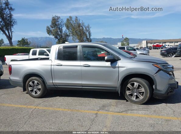 5FPYK2F58JB000785 2018 HONDA RIDGELINE Серебряный Вид задней части салона