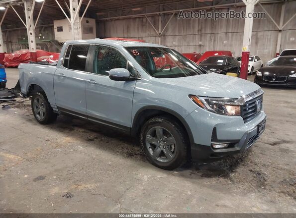 5FPYK3F5XPB062994 2023 HONDA RIDGELINE Light Blue Передняя правая четверть