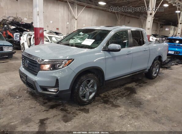 5FPYK3F5XPB062994 2023 HONDA RIDGELINE Light Blue Передняя левая четверть