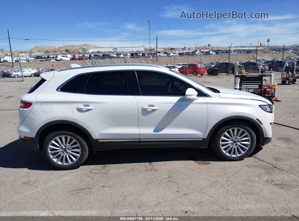 5LMCJ1C96KUL38405 2019 LINCOLN MKC White Widok wnętrza z tyłu