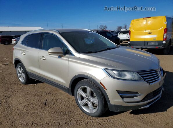 5LMCJ1D97HUL33530 2017 LINCOLN MKC Золотой Передняя правая четверть