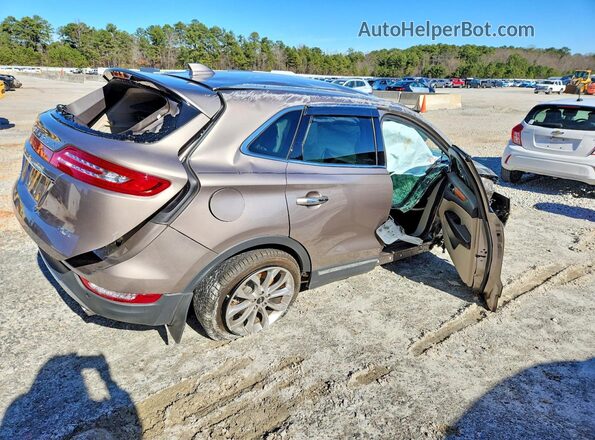 5LMCJ2C92KUL43638 2019 LINCOLN MKC Золотой Задняя правая четверть