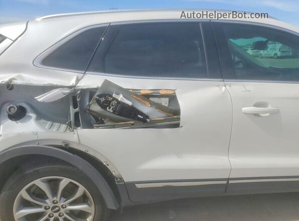5LMCJ2C94JUL22305 2018 LINCOLN MKC Белый Вид задней части салона
