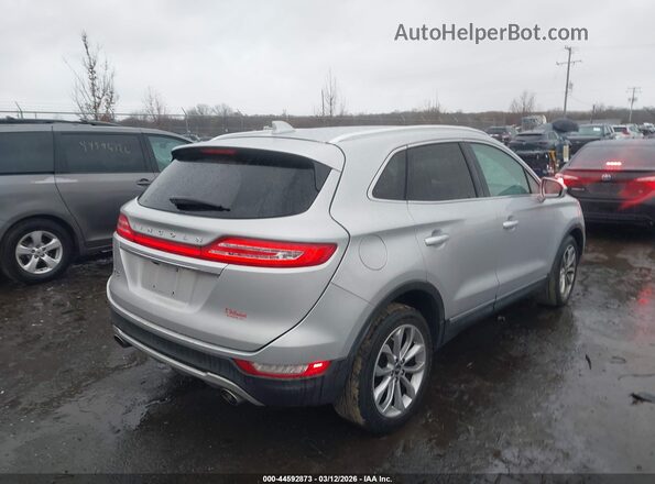 5LMCJ2C95KUL08186 2019 LINCOLN MKC Серебряный Задняя правая четверть