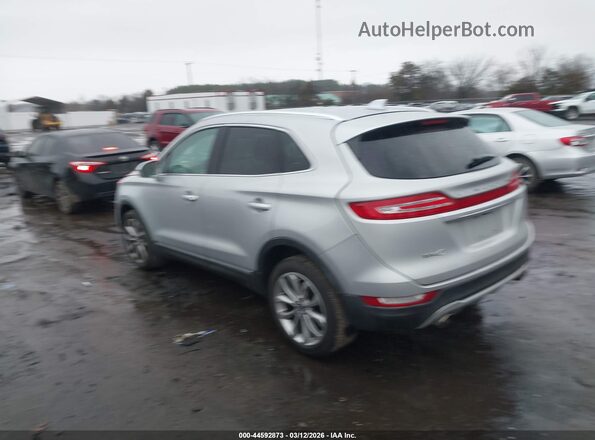 5LMCJ2C95KUL08186 2019 LINCOLN MKC Серебряный Задняя левая четверть